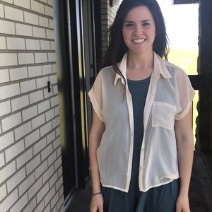 Sheer target cream top